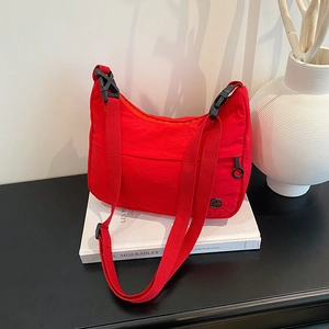 Fashionable red waterproof nylon crescent crossbody bag with adjustable wide strap