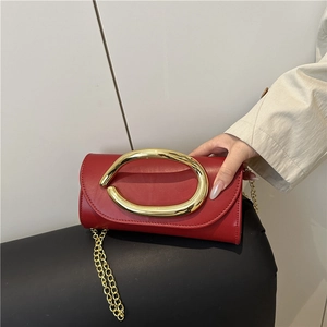Elegant red rectangle clutch bag with gold oval metal handle and fine chain strap