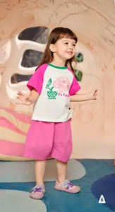 Detail shot of girls' cream and pink cotton two-piece floral t-shirt and shorts set