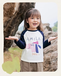 Detail view of cotton long sleeve T-shirt with cartoon dog print and raglan sleeves