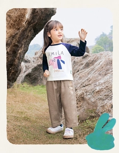 Detailed embroidery on khaki pants of kids colorblock long sleeve T-shirt set