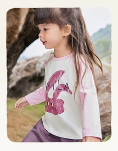 Detail of toddler girl's long sleeve T-shirt with pink raglan sleeves and rabbit graphic