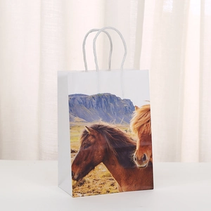 White kraft paper horse gift bag with landscape print and twisted rope handles
