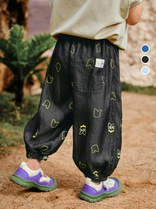 Zwarte joggingbroek voor jongens met neon kattenprint en elastische manchetten onder