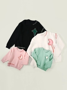 Family matching knit sweaters in black, white, pink and mint with contrast stitching
