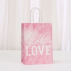 Detailed close-up of a pink marble pattern gift bag with white rope handles and Hello LOVE text