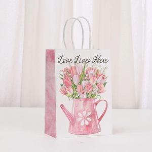 Floral kraft paper gift bag with tulip design and Love Lives Here print for shopping