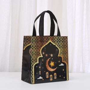 Eid Mubarak Vlies-Geschenktüte mit goldenen Stern- und Mondmustern auf schwarzem Stoff