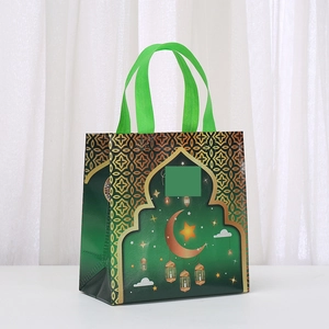 Vlies-Geschenktüte mit Mond-Aufdruck und grünen islamischen Mustern für Geburtstage