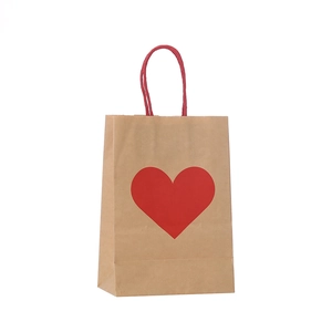 Brown kraft paper gift bag with red heart print and red twisted rope handles