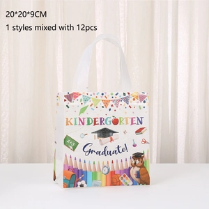 Set of 12 white non-woven graduation gift bags for kindergarten with owl and pencil prints