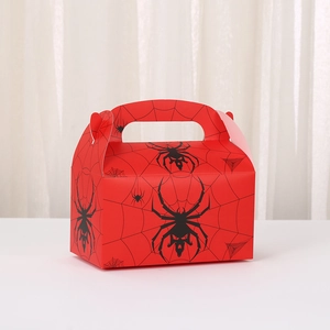 Detail of red Halloween paper gift box featuring black spider and cobweb prints
