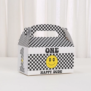 Detail of checkered party gift box with yellow smiley face and One Happy Dude text