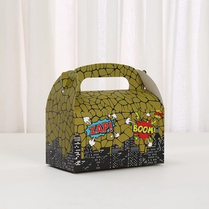Comic style yellow cake box with city silhouette and BOOM ZAP patterns for birthday party