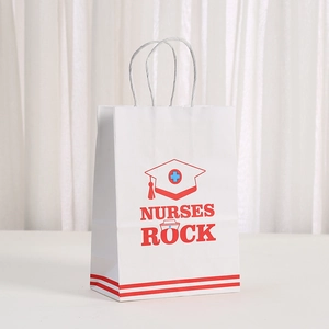 Nurse Appreciation gift bag with NURSES ROCK print and medical cross icon on white paper