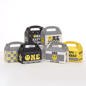 Detail of One Happy Dude yellow party gift boxes with checkered patterns and smiley faces