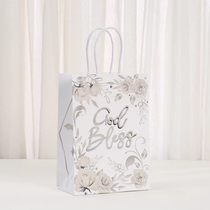 White floral gift bag with silver God Bless lettering and white rope handles
