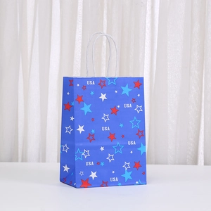 Blue kraft paper gift bag with USA text and star patterns for Independence Day