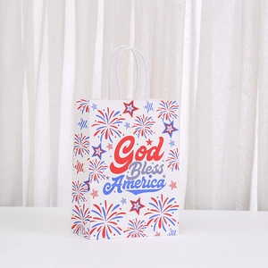 God Bless America Independence Day kraft paper gift bag with patriotic fireworks design