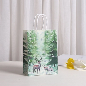 Sac cadeau en papier kraft imprimé renne de forêt d'hiver avec poignées blanches