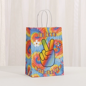 Rainbow tie-dye paper gift bag featuring peace sign and In love with the sun text print