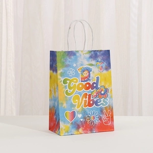 Colorful tie-dye kraft paper gift bag with Good Vibes print and white rope handles