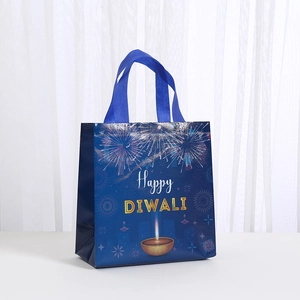 Blue non-woven Diwali gift bag with Happy Diwali print and sturdy ribbon handles