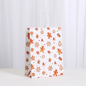 Sac cadeau de Noël en papier kraft blanc avec motifs festifs de bonhomme en pain d'épice
