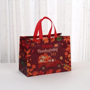 Red Happy Thanksgiving non-woven gift bag with pumpkin truck print and red handle