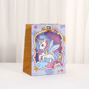 Cartoon unicorn gift bag with gold glitter sides and woven handles for party favors