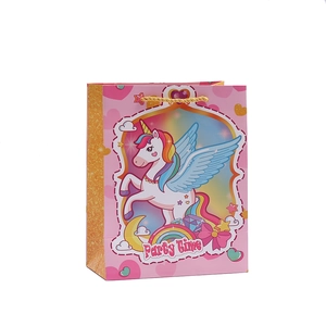 Pink cartoon unicorn gift bag with golden handles and Party Time design on white background
