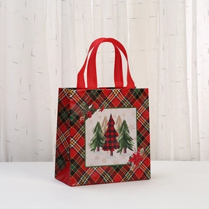 Christmas non-woven gift bag featuring festive red plaid pattern and Christmas tree print