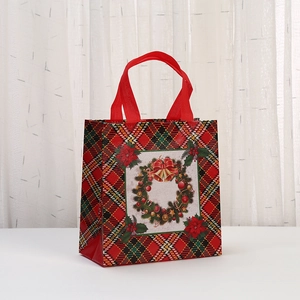 Christmas non-woven gift bag with red plaid pattern and festive holiday wreath print