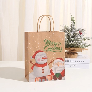 Brown kraft Christmas gift bag with Santa and snowman print and twisted paper handles