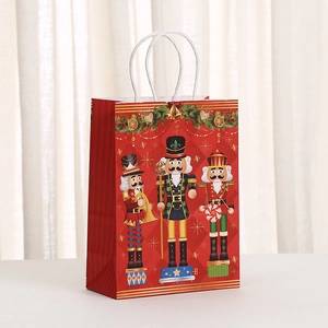Close-up of Nutcracker soldiers printed on a red Christmas gift bag with rope handles