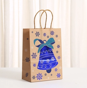 Close-up of blue bell pattern on kraft paper gift bag with durable rope handles