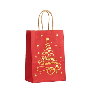 Red Kraft Christmas paper gift bag with golden foil tree and Merry Christmas print