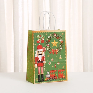 Nutcracker Christmas gift paper bag with festive illustrations and white rope handles