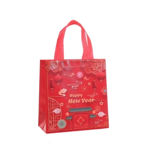 Red non-woven New Year gift bag with golden clouds and lanterns pattern