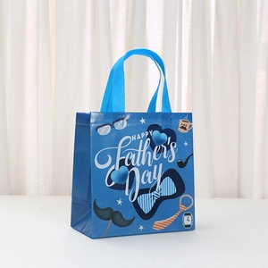Blue Happy Father's Day non-woven gift bag with festive tie and mustache illustrations