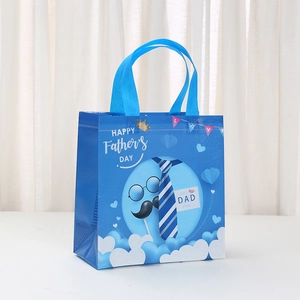 Blue Father's Day non-woven gift bag with Happy Father's Day text and tie pattern
