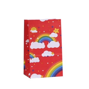Red paper gift bag featuring cartoon rainbow sun and star prints for party favors