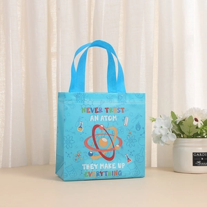 Blue science themed non-woven tote bag with atom illustration and humorous quote