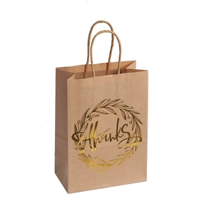 Brown kraft paper gift bag with gold foil Thanks lettering and twisted rope handles