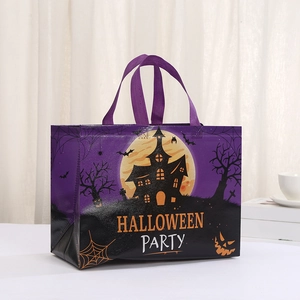 Detail of Halloween non-woven gift bag with purple castle print and wide handles