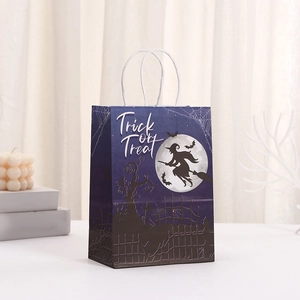 Detail of Halloween gift bag featuring Trick or Treat text and witch silhouette motif
