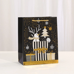 Christmas gift bag in black with elk snowman prints and golden rope handles