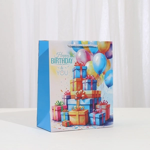 Cartoon birthday gift paper bag with colorful balloons and braided rope handle