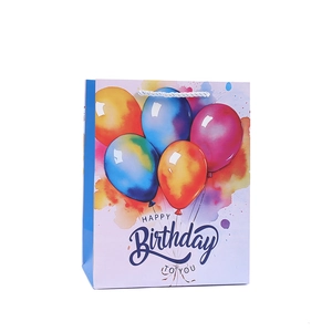 Colorful balloon print paper gift bag with Happy Birthday text and white handles