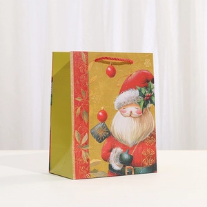 Christmas gift bag with hand-painted Santa Claus illustration and red woven handles